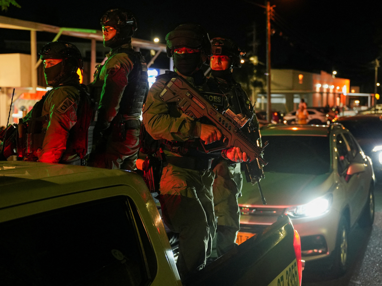 National Police keep guard while Colombian presidential candidate Paloma Valencia attends a press conference following an explosives attack in the Cauca region. Photo: Reuters