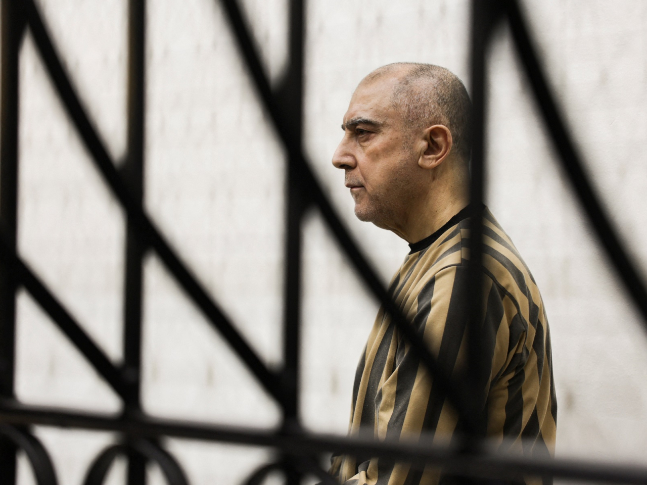 The former head of the Political Security Department in Daraa, Atef Najib, faces charges of committing war crimes at a trial in the Palace of Justice in Damascus. Photo: Reuters