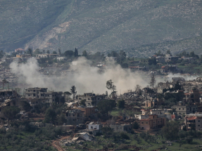 Smoke rises in Lebanon following an Israeli strike, as Lebanese authorities report 14 deaths from Israeli fire. Photo: Reuters