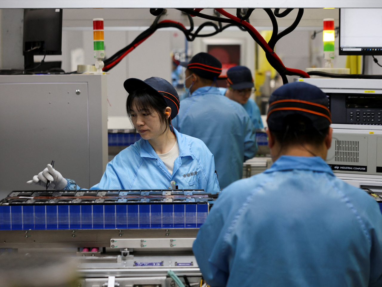 The EU plan implicitly requires Chinese makers of batteries and electric vehicles to partner with European firms and pass on know-how. Photo: Reuters