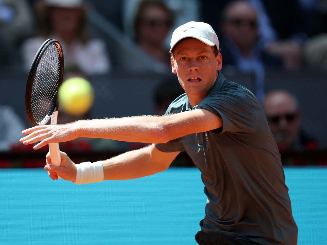 The Italian world No 1 extends his match-winning streak to 25 after beating Britain's Norrie to reach the last eight. Photo: Reuters