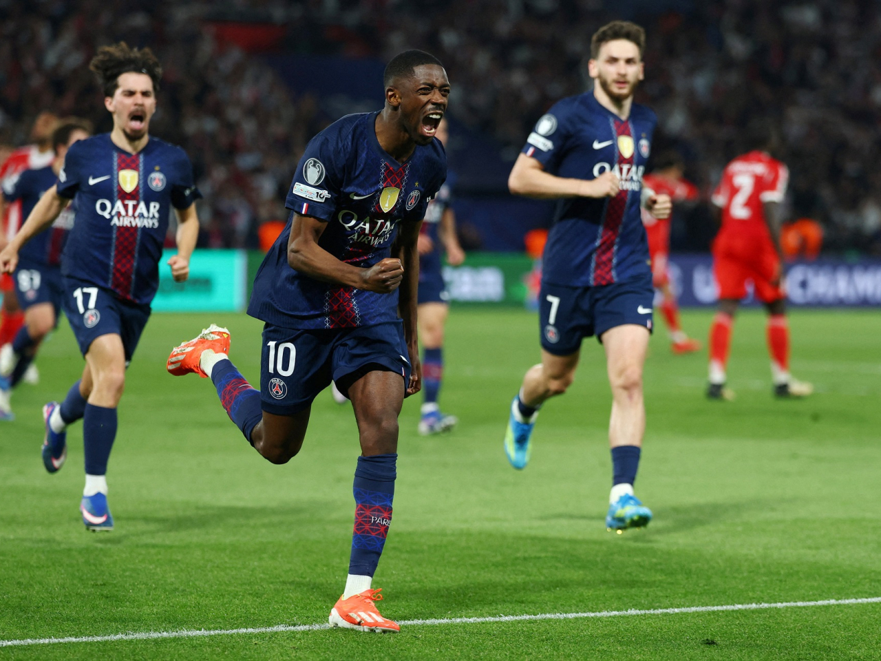 Paris Saint-Germain's Ousmane Dembele celebrates after scoring his side's third goal against Bayern Munich. Photo: Reuters