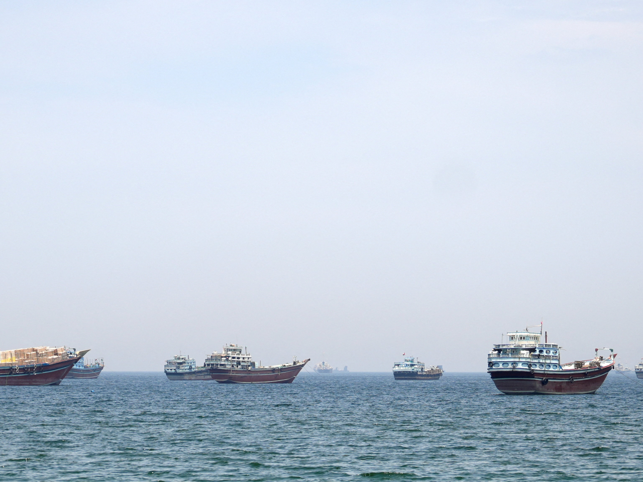 Ships and boats lie anchored off Musandam, Oman, in the Strait of Hormuz. Photo: Reuters