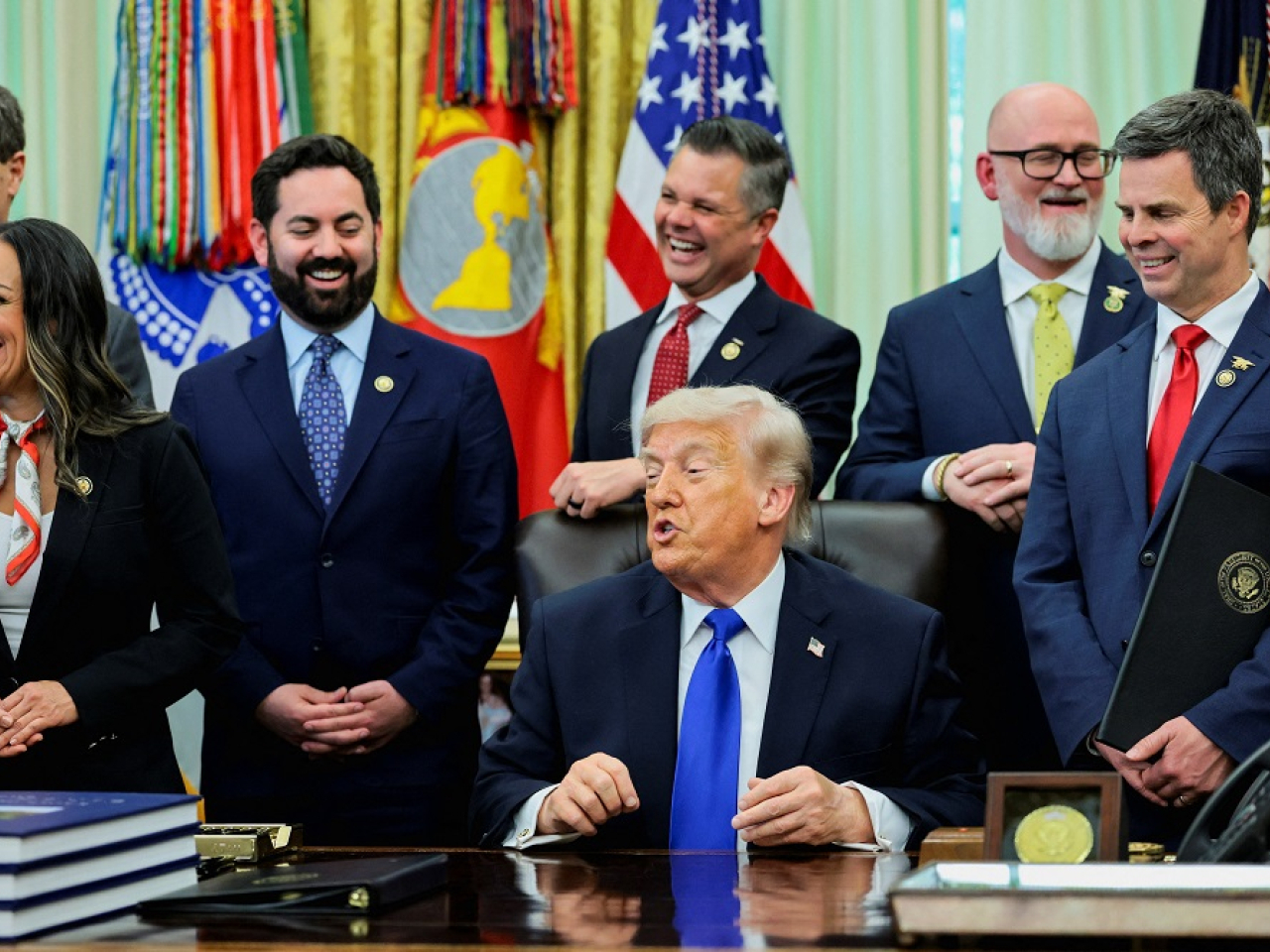 US President Donald Trump told reporters in the Oval Office, "Well, if Gianni said it, I'm OK. I think let 'em play." Photo: Reuters