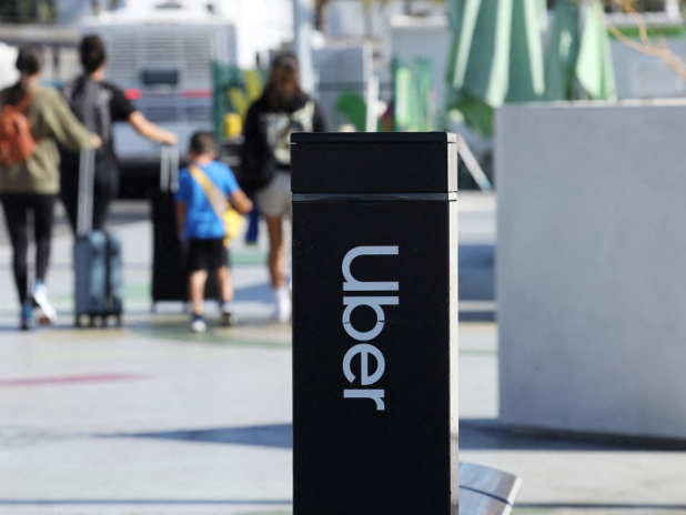 Uber says acquiring e-hail taxi startup FlyTaxi