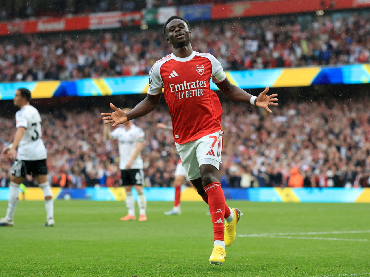 Arsenal's Bukayo Saka celebrates scoring their second goal as the Gunners gave themselves a boost in their title race with Manchester City. Photo: Reuters