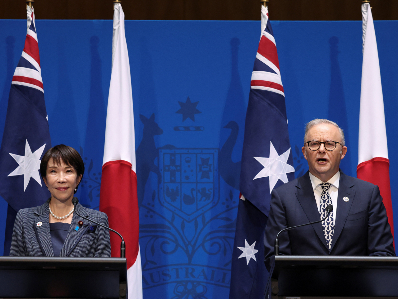Anthony Albanese speaks next to Sanae Takaichi during a press conference at Parliament House in Canberra. Photo: Reuters