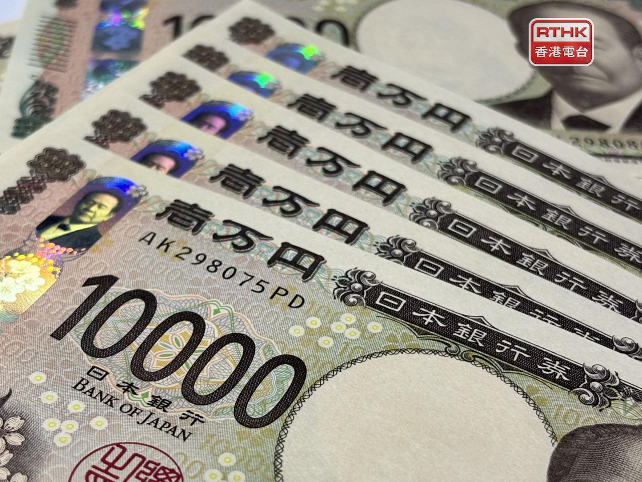 日圓中午一度急升至155兌1美元，升約1.8%，亞太區時段早段則貼近158水平。（港台圖片）