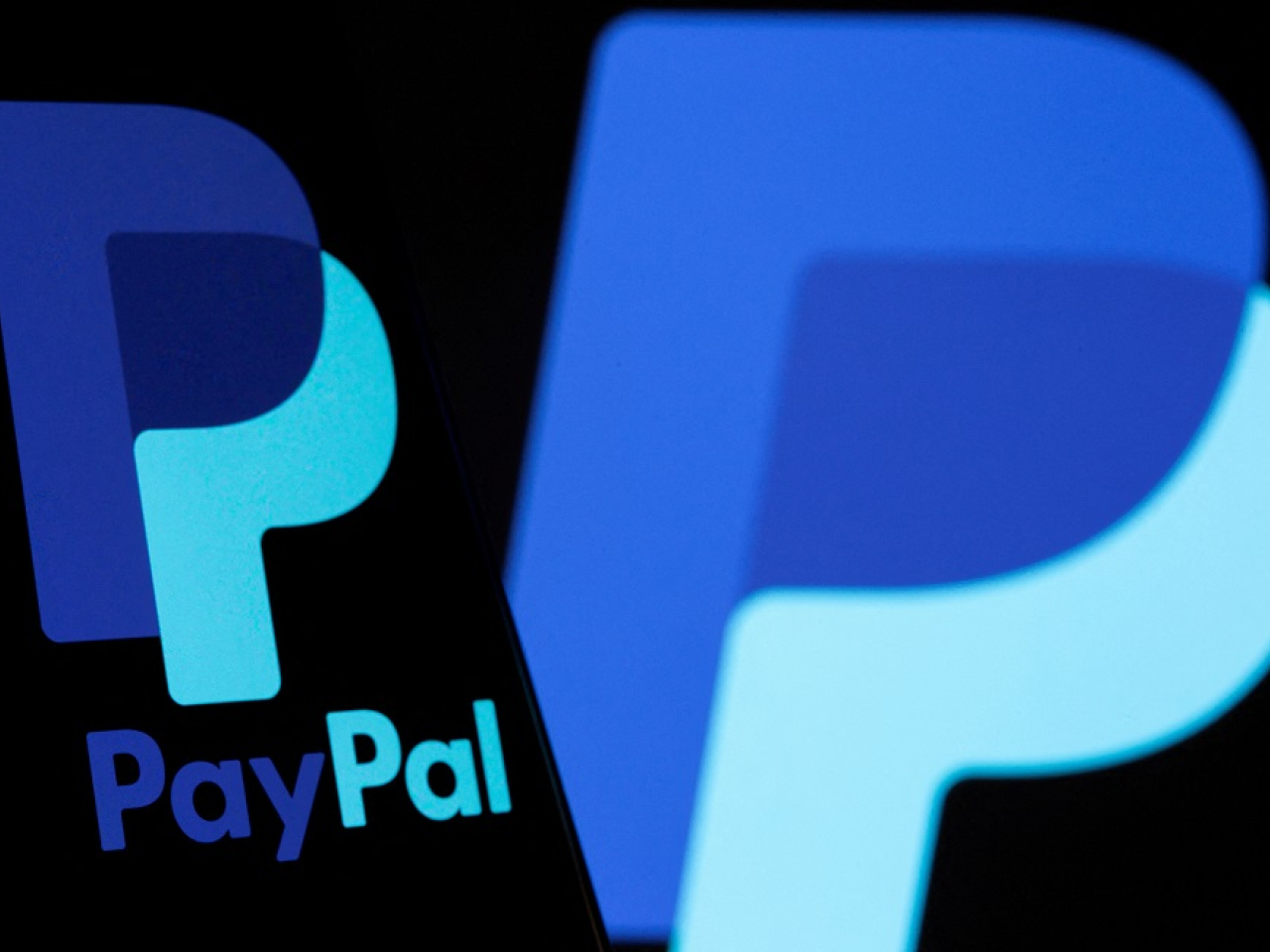 PayPal lets users pay using a linked bank card or bank account. File photo: Reuters