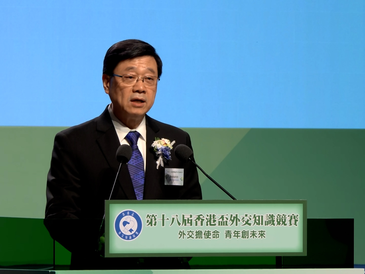 John Lee says Hong Kong can serve the overall development of China by nurturing a broad international perspective in the next generation. Photo: RTHK