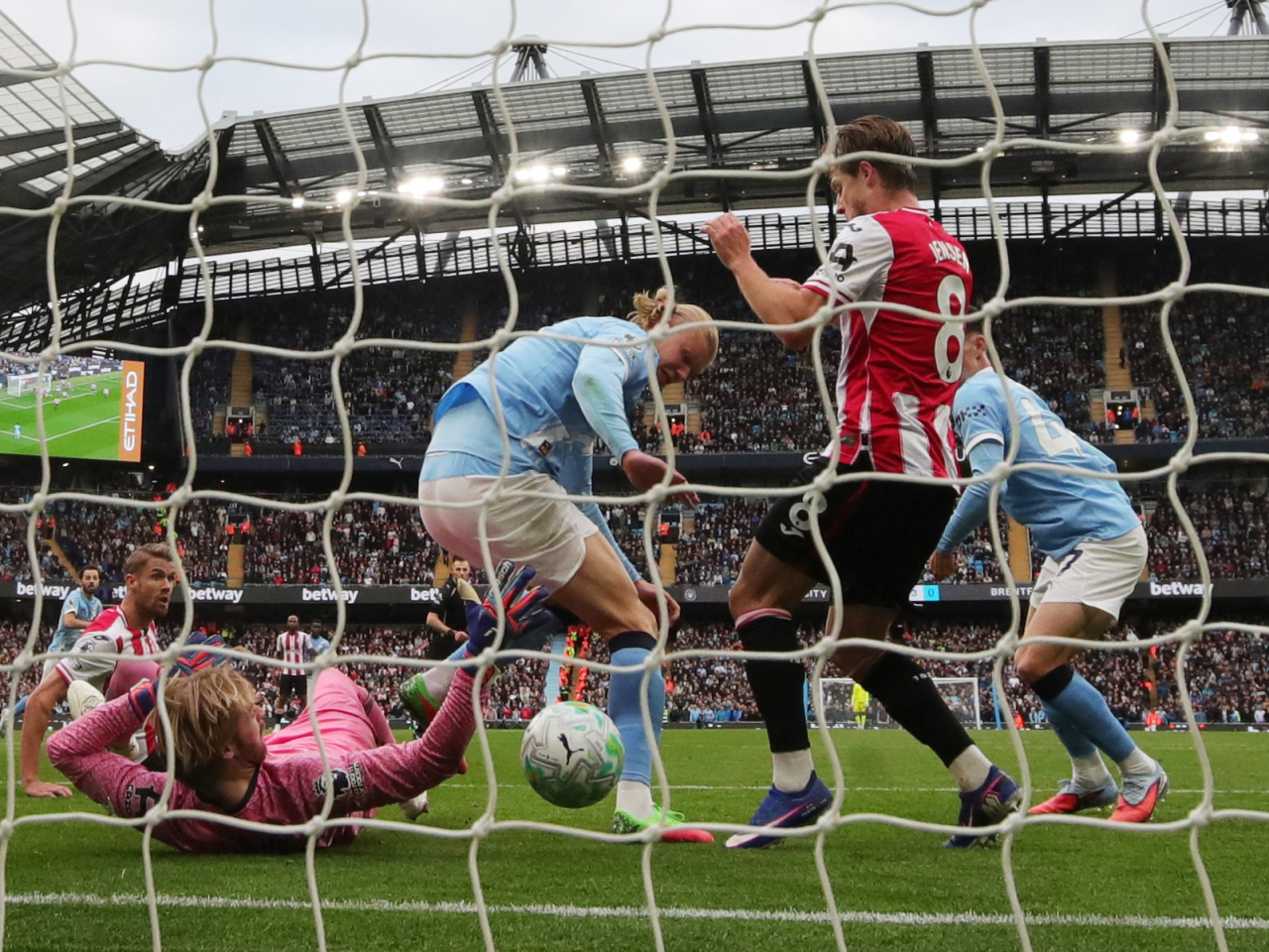 Erling Haaland backheeled in a second to move four goals clear of Brentford's Igor Thiago in the battle for the Golden Boot. Photo: Reuters