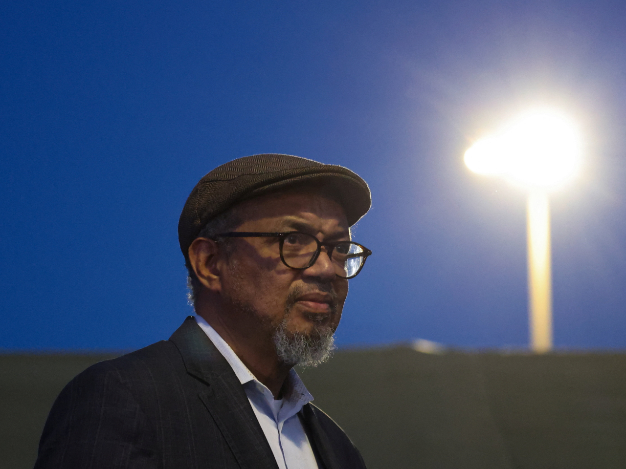 Director-General of the World Health Organisation, Tedros Adhanom, looks on as officials gather in Tenerife, where the cruise ship MV Hondius is expected to dock. Photo: Reuters