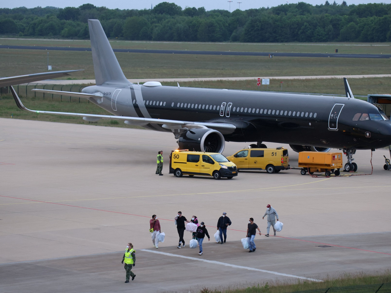 Passengers of the cruise ship MV Hondius arrive at the Eindhoven Air Base in the Netherlands. Photo: Reuters