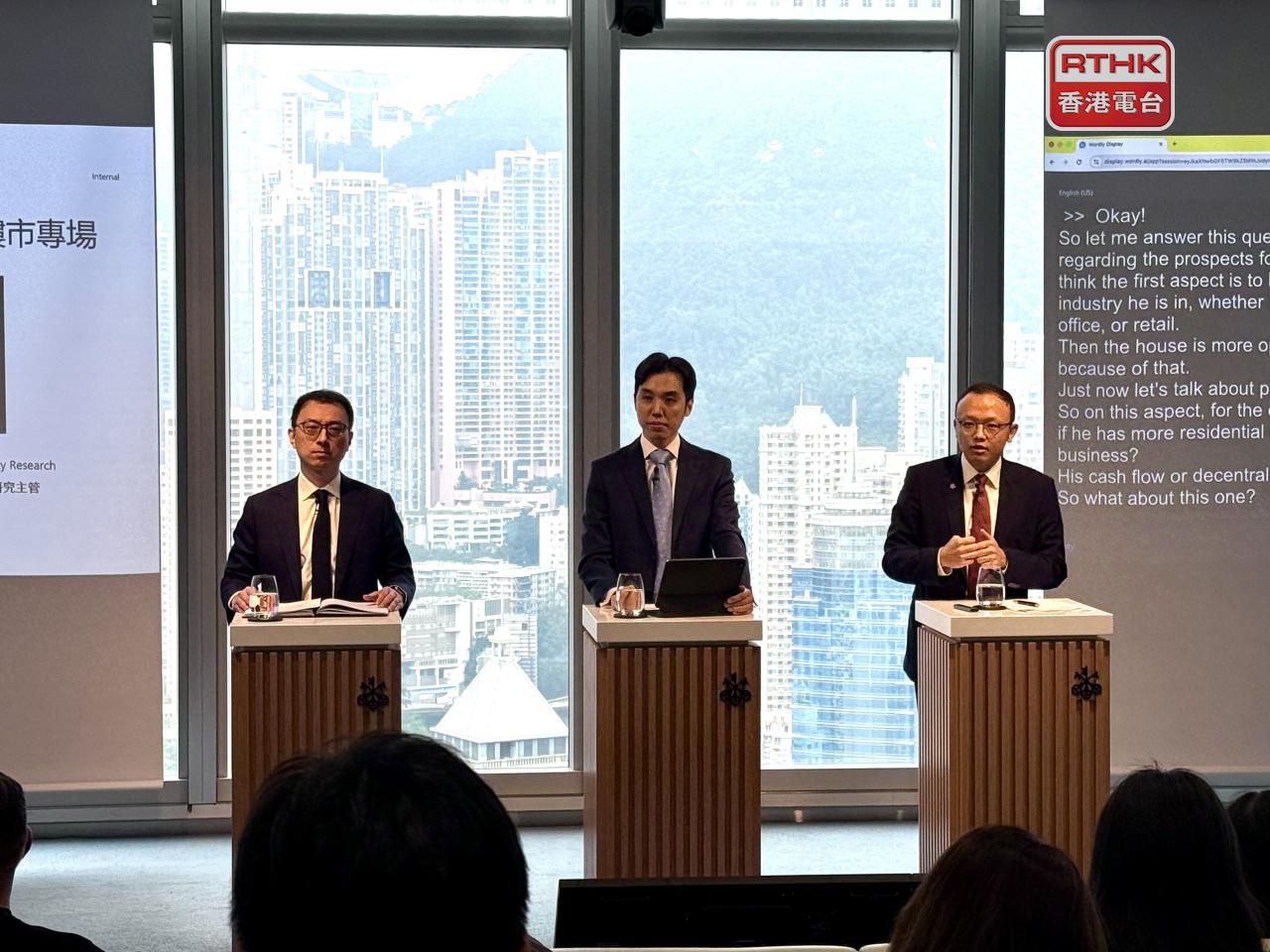 林鎮鴻（右）估計，今年本港住宅樓價升5%至10%。（趙嘉駿攝）