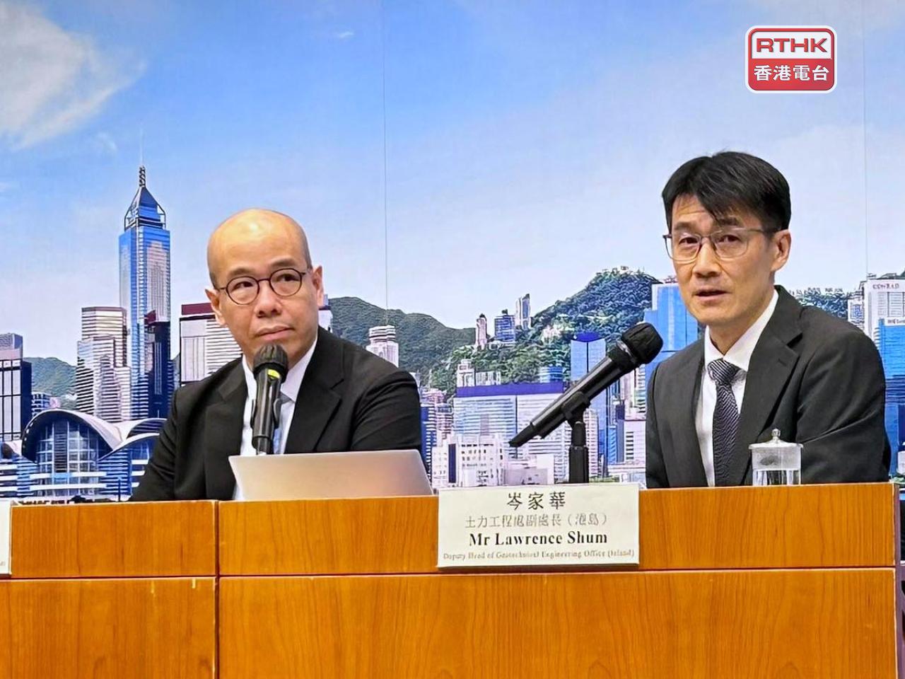 Lawrence Shum, right, says the Civil Engineering and Development Department has almost completed the first phase of the "Smart Slope Catalogue". Photo: RTHK
