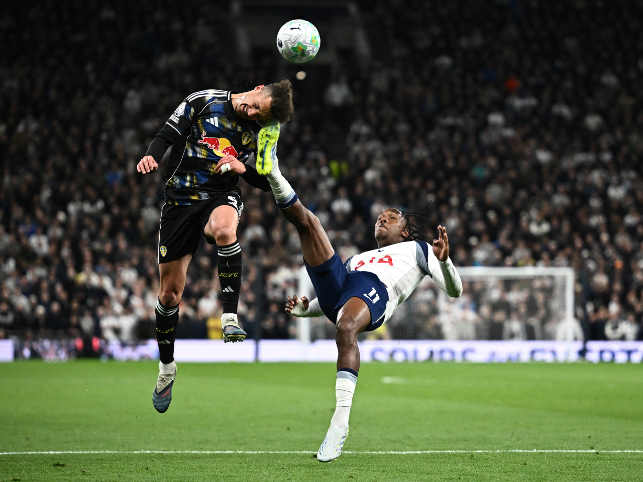 Tottenham's Mathys Tel caught Leeds captain Ethan Ampadu in the face with an attempted clearance midway through the second half. Photo: Reuters