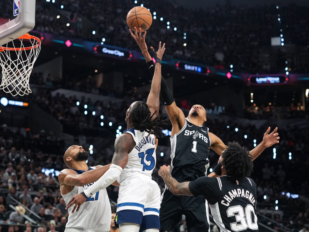 Wembanyama (1) finished with 27 points and 17 boards to lead San Antonio's rout of Minnesota in game five. Photo: Reuters