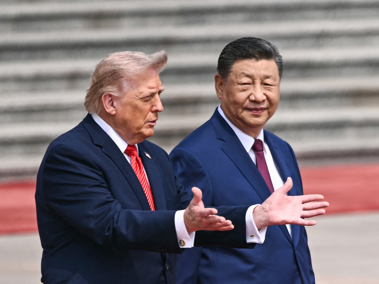 Xi greeted Trump outside the Great Hall of the People. Photo: AFP