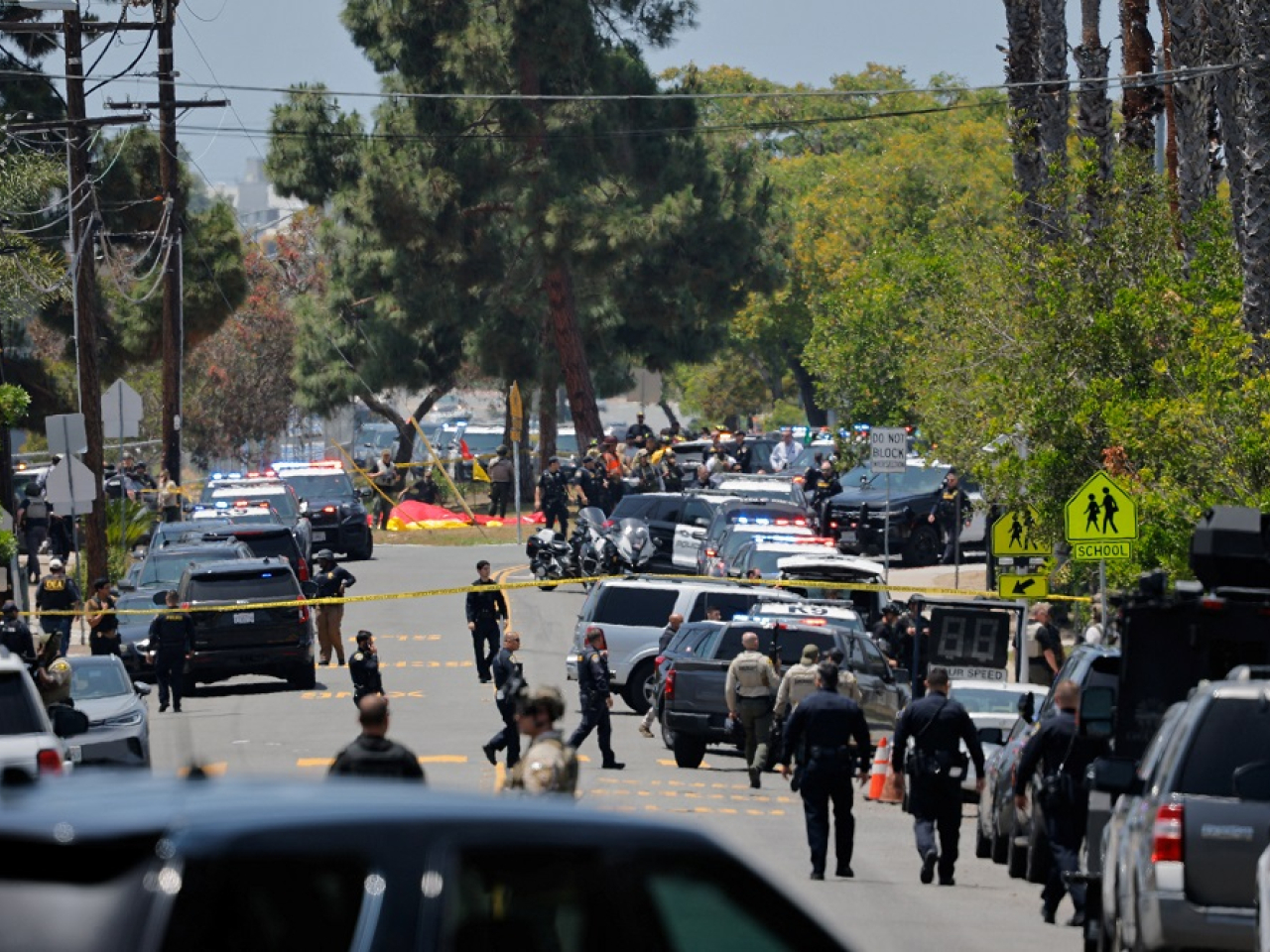 The Islamic Centre complex was swarming with police within minutes. Photo: Reuters