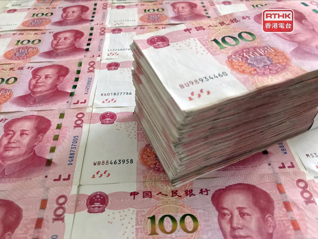 人民幣中間價報6.8397兌1美元，較昨日中間價跌22點子，自逾3年高位回落。（港台圖片）