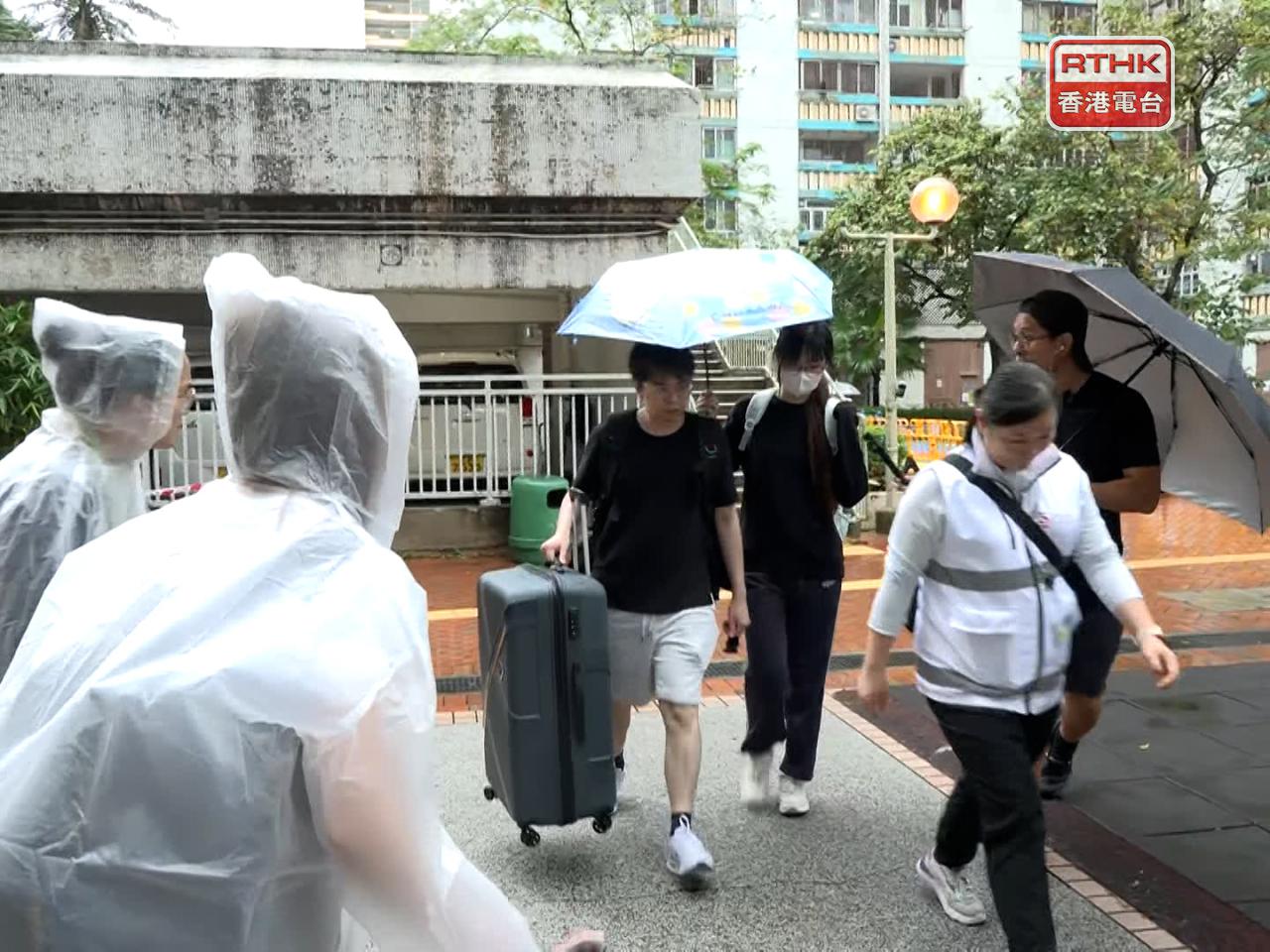 For some of those displaced by the Wang Fuk Court inferno, the second return trip is a chance to salvage more belongings or to bid farewell. Photo: RTHK