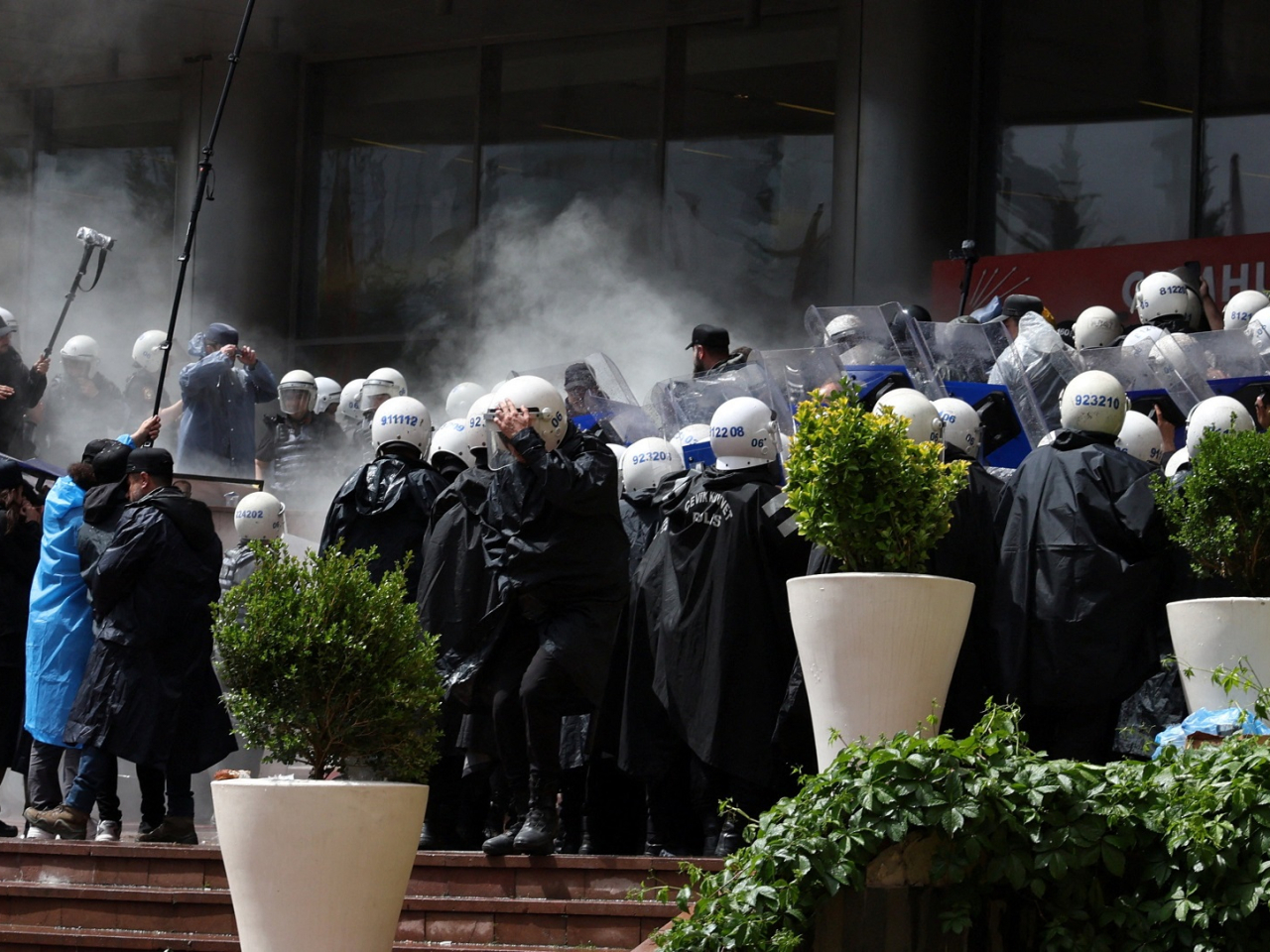 Riot police enter the CHP headquarters in Ankara, evicting its ousted leadership. Photo: Reuters