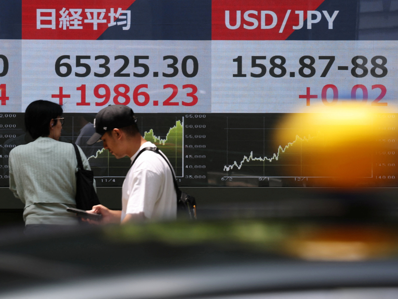 The Nikkei ended 1,819 points, or 2.87 percent, higher at 65,158 in Tokyo on Monday. Photo: Reuters