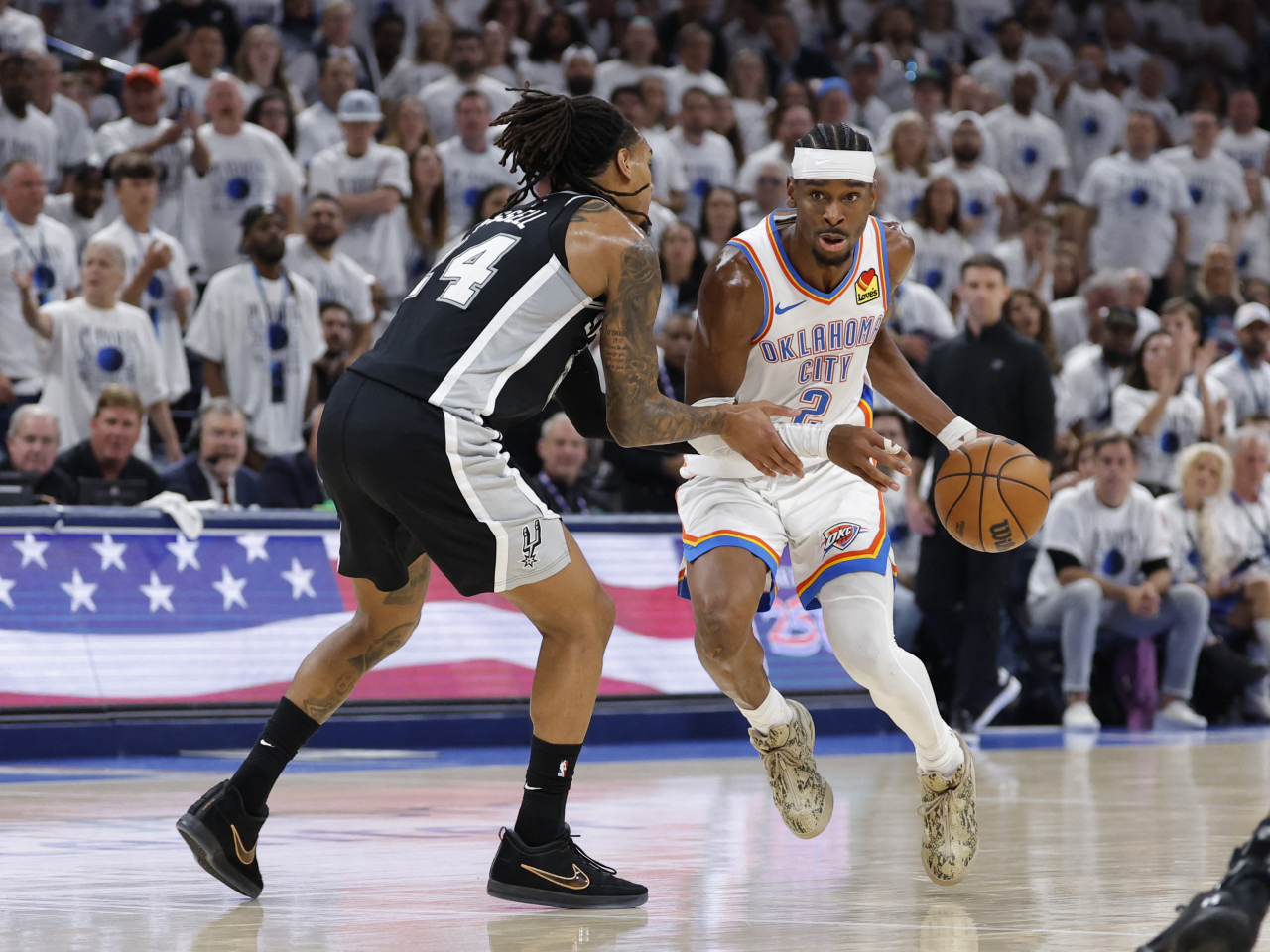 Reigning MVP Shai Gilgeous-Alexander, right, tallied 32 points to put the Thunder one win away from their second consecutive championship series. Photo: Reuters