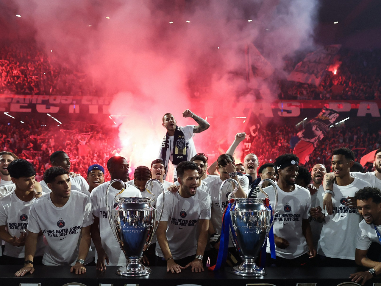 Paris St Germain players celebrate their second straight Champions League victory at the Parc des Princes stadium. Photo: Reuters