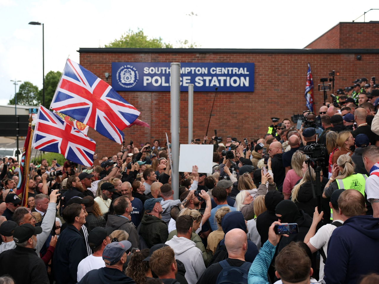 Demonstrators gathered outside Southampton Central Police Station following the conviction of Vikrum Digwa for the murder of student Henry Nowak. Photo: Reuters