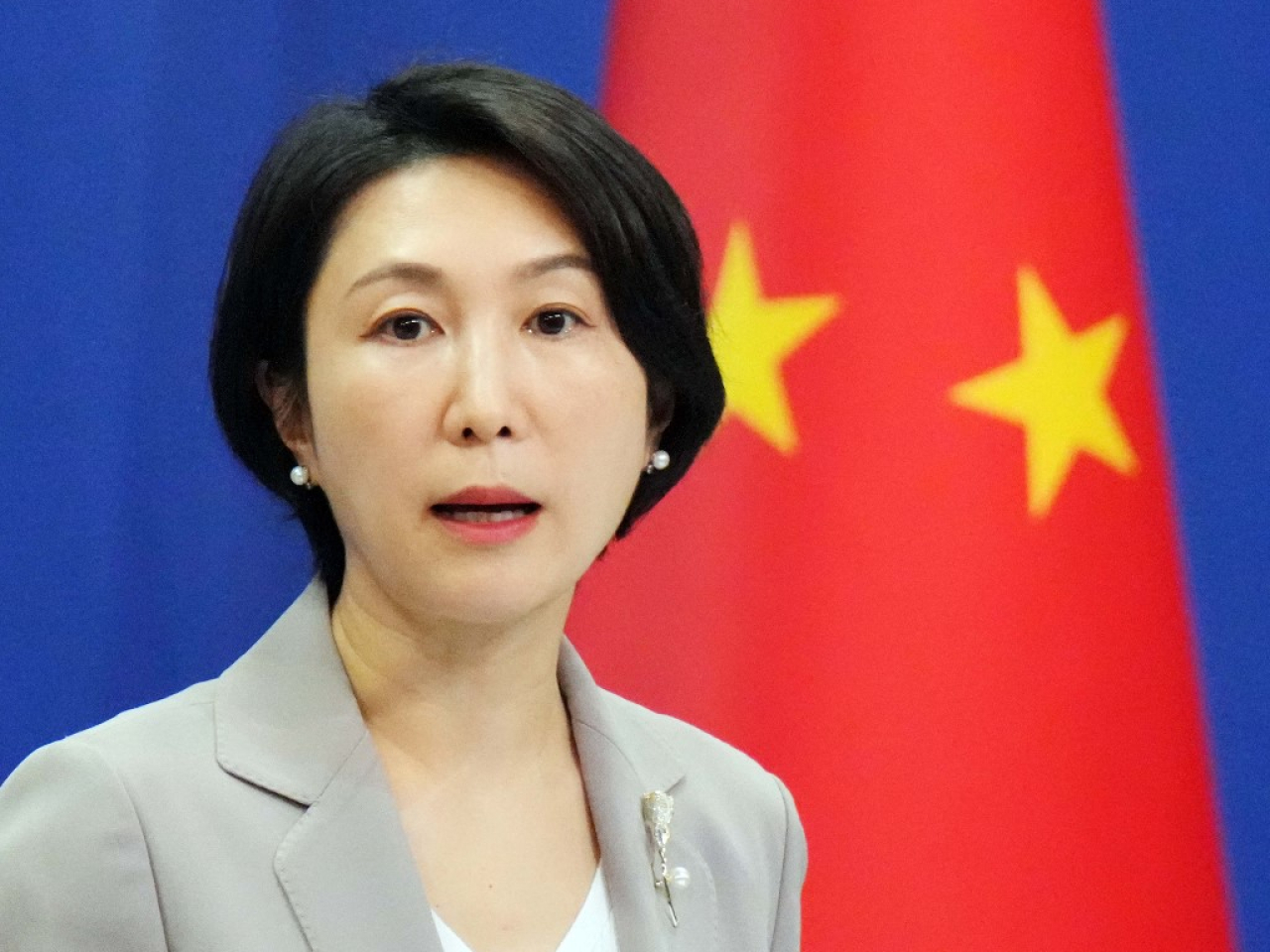 毛寧指關稅與貿易戰不符合任何一方利益。（法新社資料圖片）
