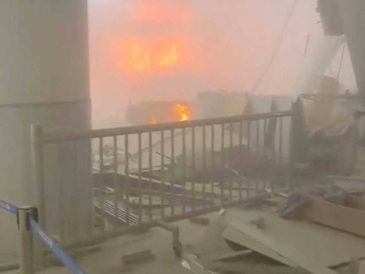 Flames were seen at the Kuwait International Airport. Photo: Reuters
