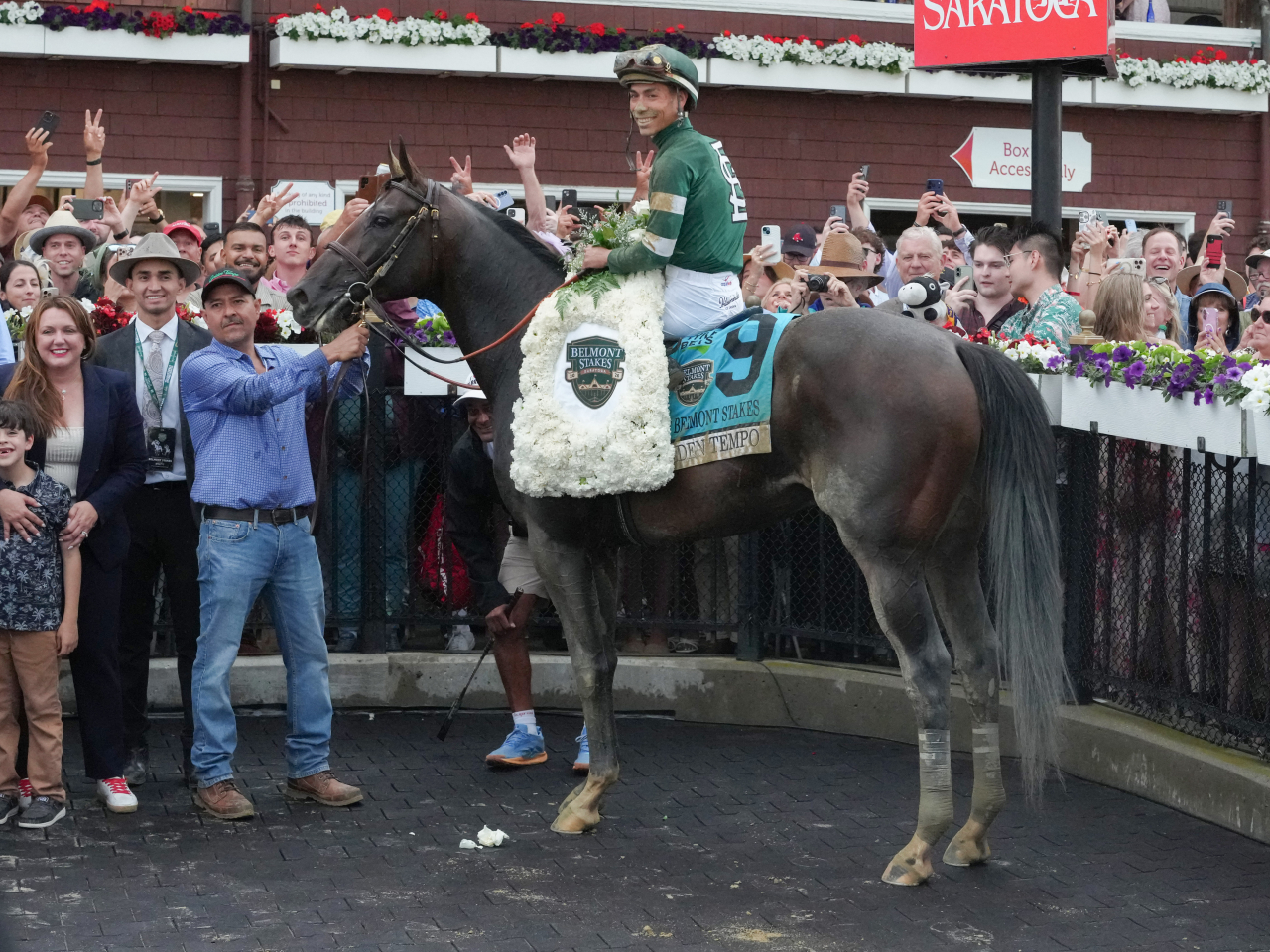 Golden Tempo with Jose L. Oriz up poses in the winner&rsquo;s circle after winning the Belmont Stakes at Saratoga Race Course. Photo: Reuters