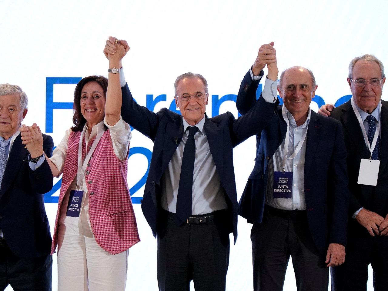 Florentino Perez, centre, celebrates his re-election as Real Madrid president. Photo: Reuters