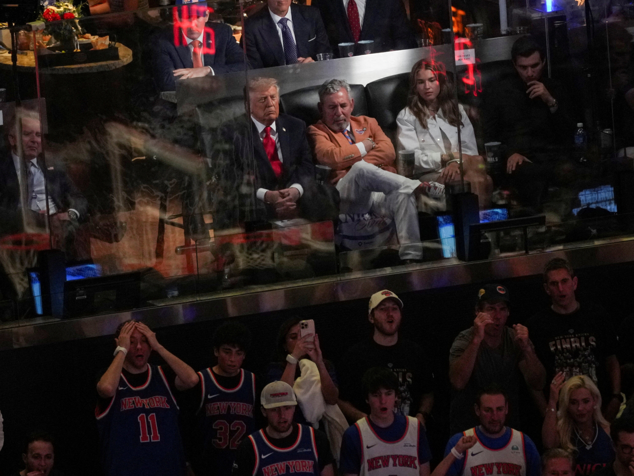 Donald Trump, at game three of the NBA Finals in New York, says a US-Iran deal can be signed in 'two or three days'. Photo: Reuters