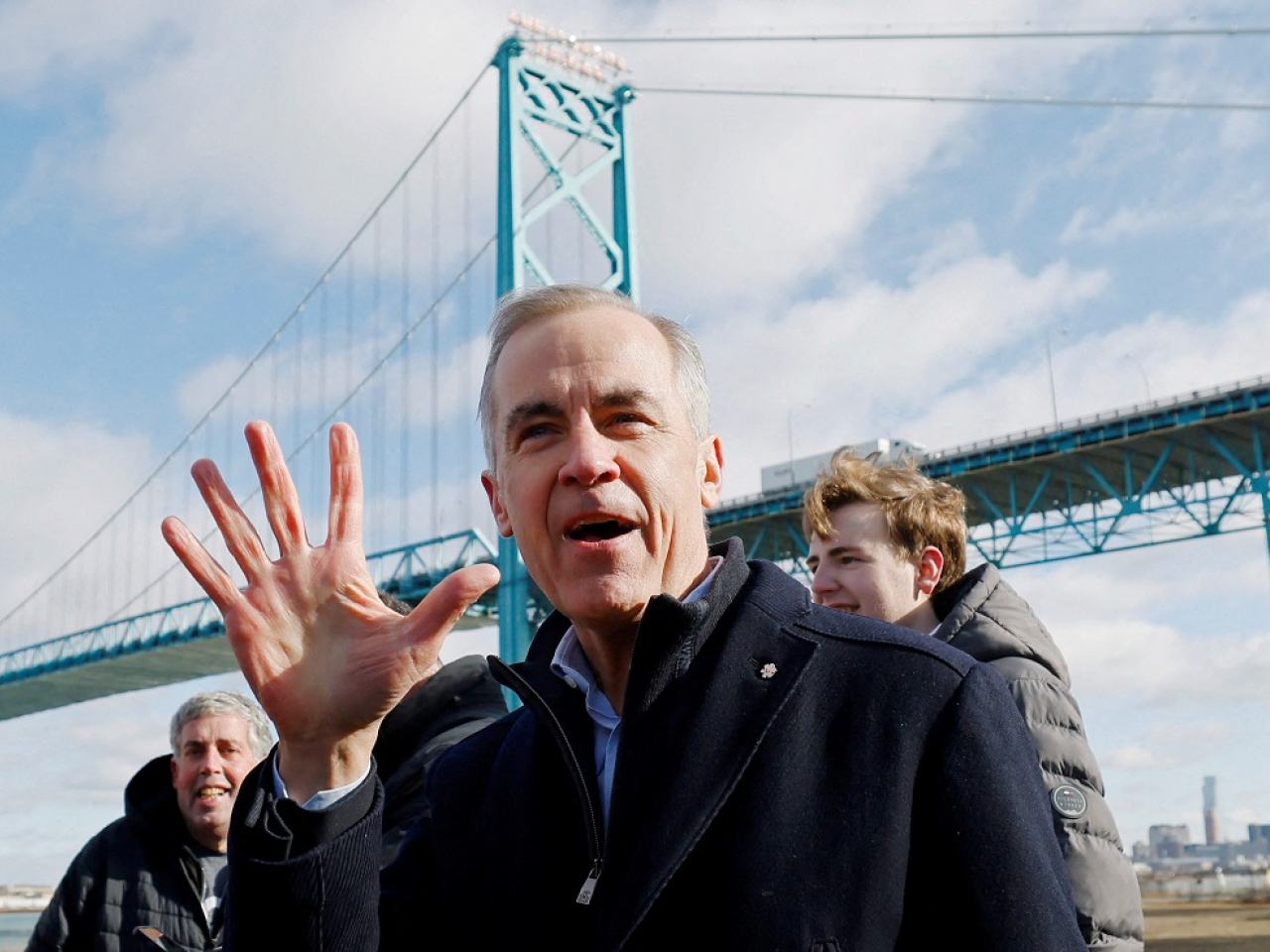 Mark Carney visited the Ambassador Bridge earlier this year. He says the Gordie Howe International Bridge will open this week. File photo: Reuters