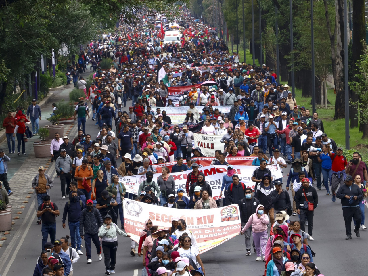 Teachers and studens from Ayotzinapa school march to the Ciudad de Mexico Stadium in Mexico City. Photo: AFP