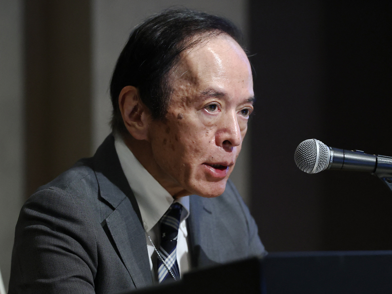 日本央行總裁植田和男入院約兩星期，將缺席下星期舉行的議息會議。（法新社資料圖片）