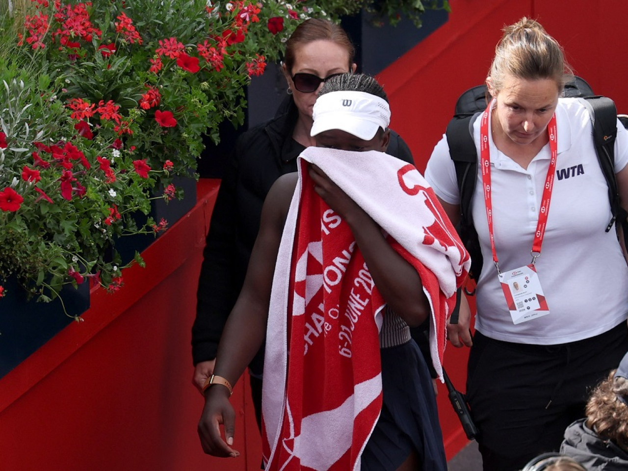 Canadian teenager Victoria Mboko was visibly upset after being forced to retire from her singles match with a suspected knee injury. Photo: Reuters