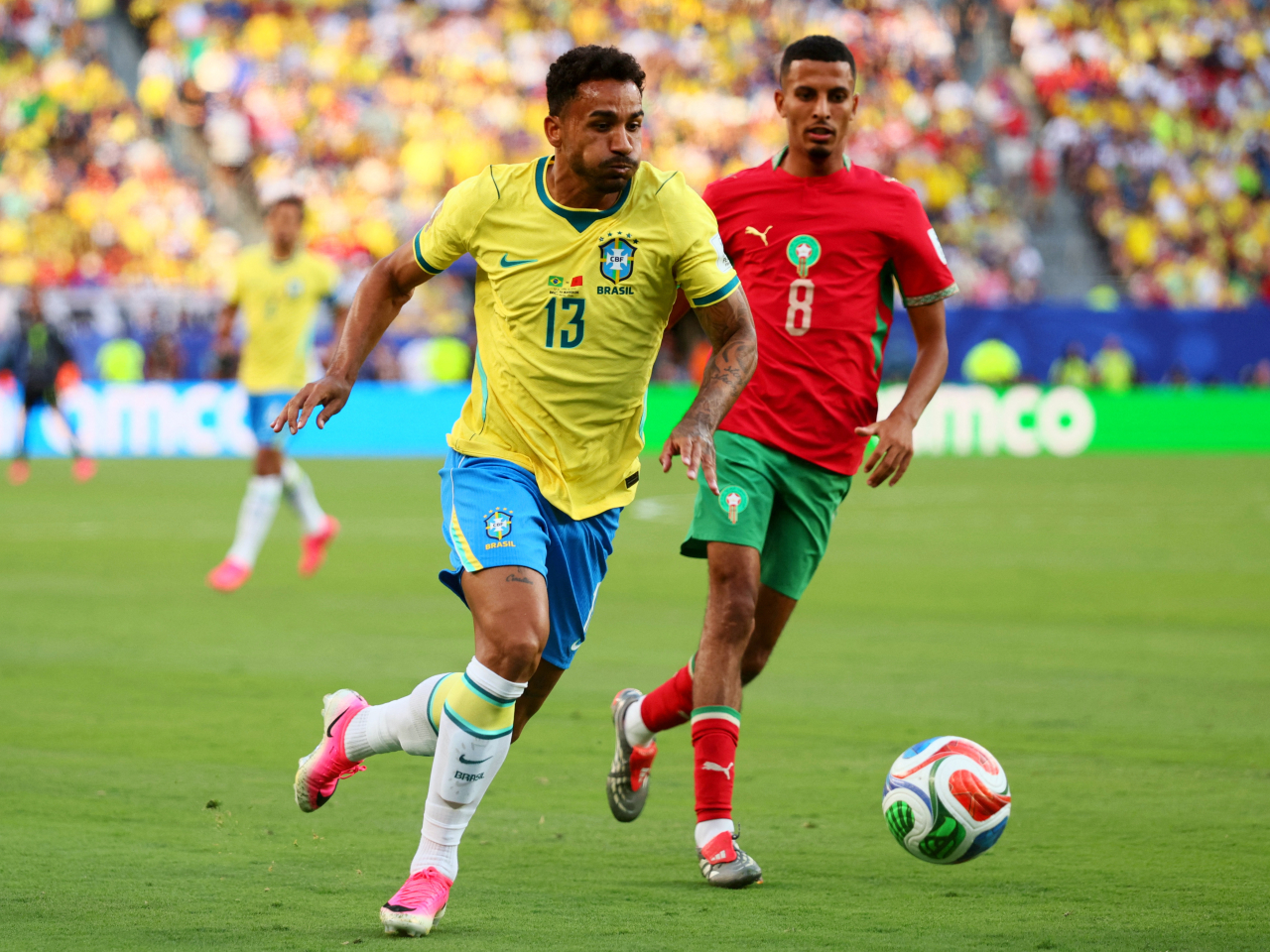Brazil's Danilo in action with Morocco's Azzedine Ounahi. Photo: Reuters