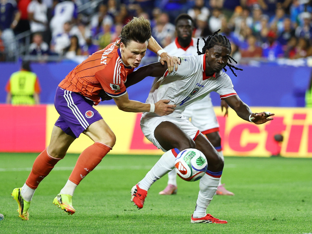 Scotland's Scott McTominay in action with Haiti's Ricardo Ade. Photo: Reuters