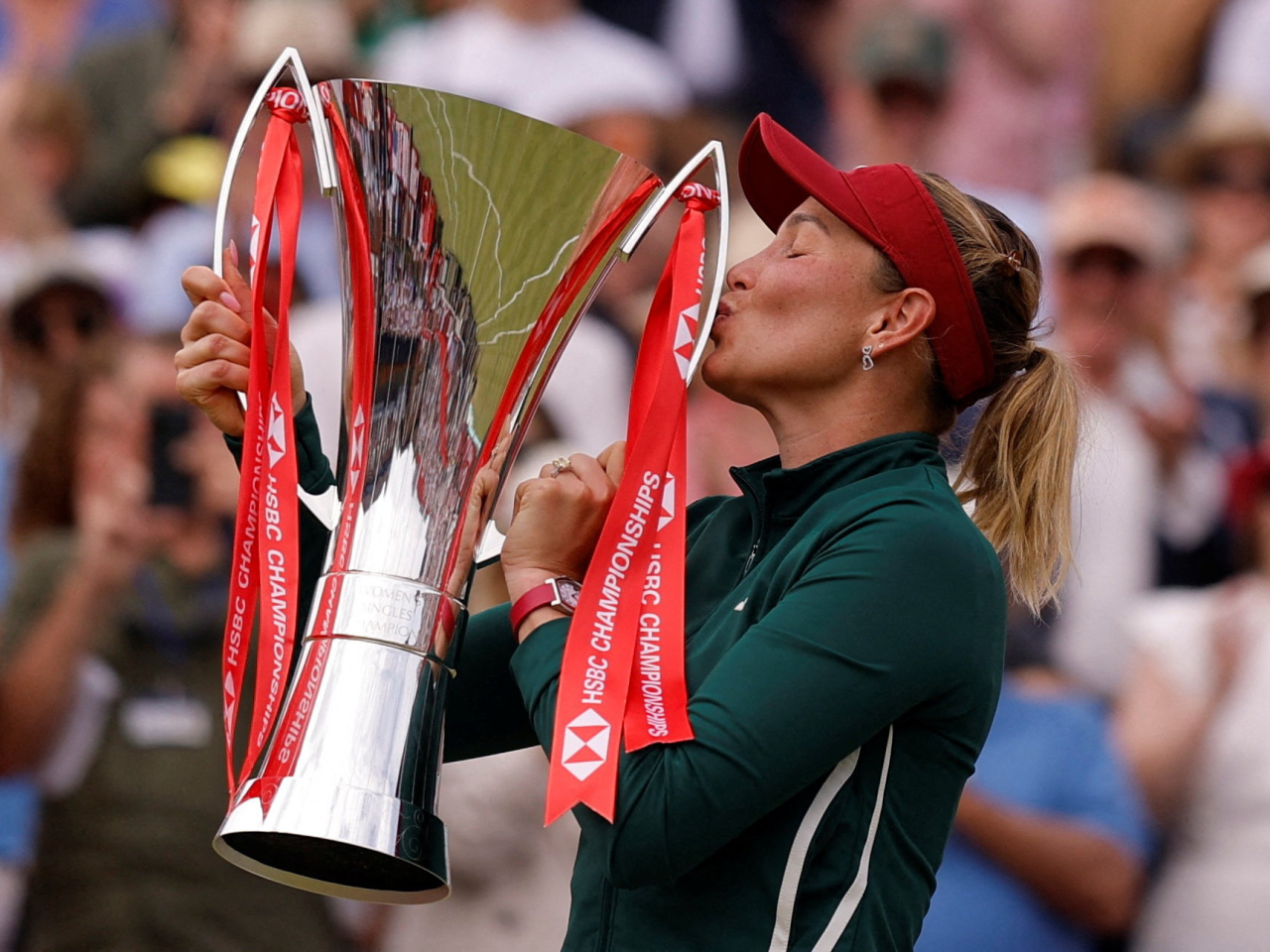 Croatia's Donna Vekic kisses the trophy after winning the Queen's Club final. Photo: Reuters