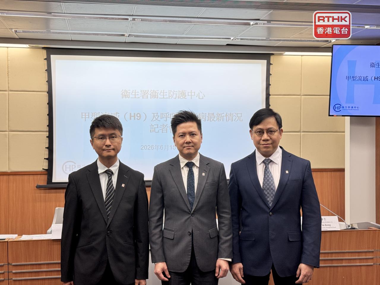 Edwin Tsui (centre) says the two-year-old boy who fell ill contracted the H9N2 virus. Photo: RTHK