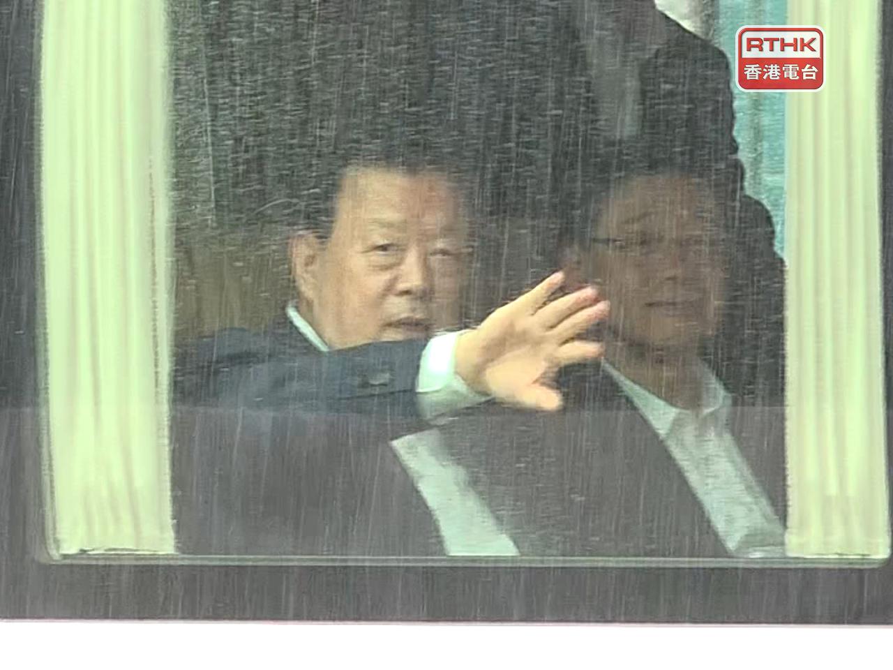 Chief Executive John Lee accompanies Xia Baolong (left) during an inspection of the Kwai Chung container terminals. Photo: RTHK