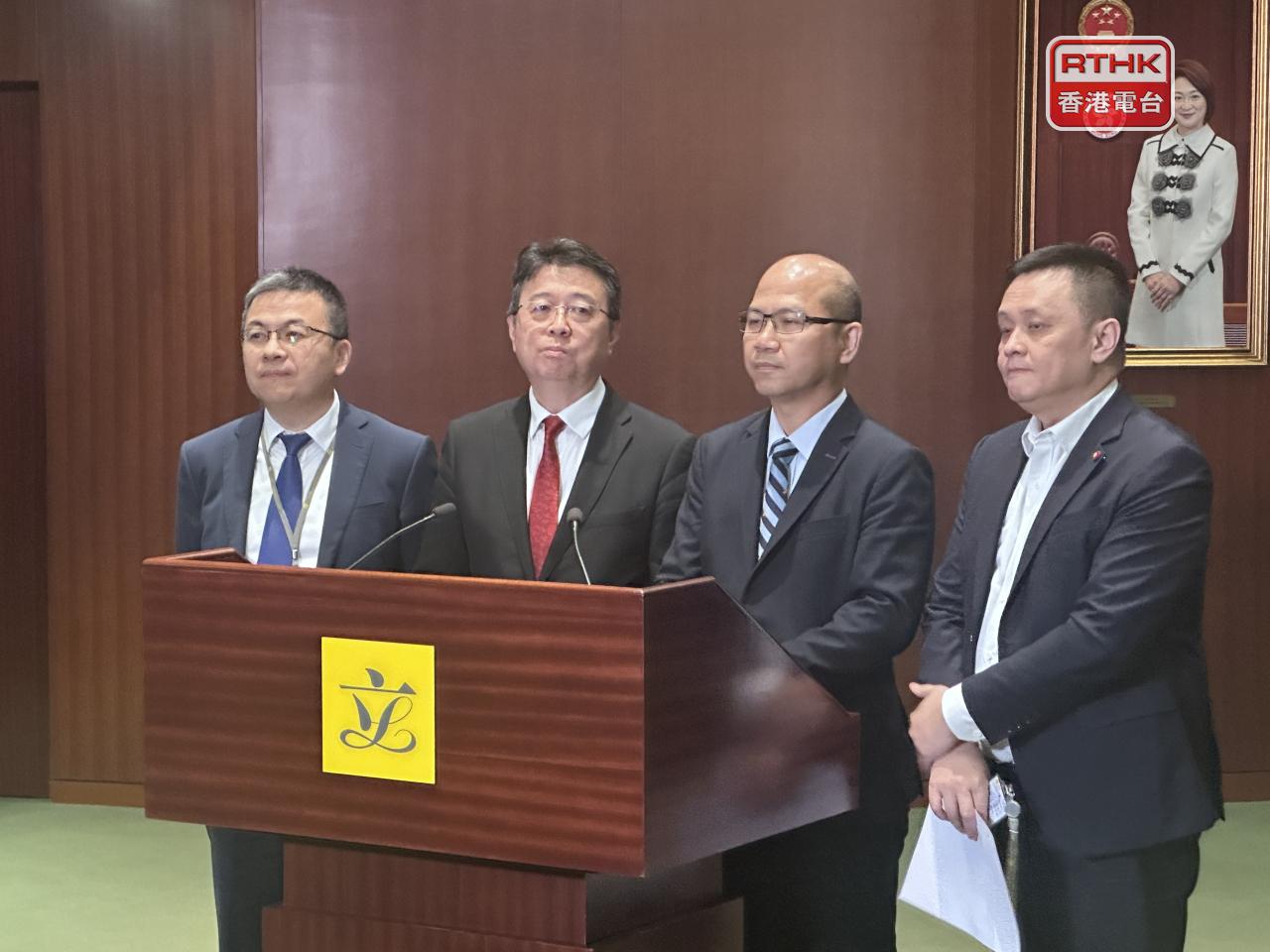 Lau Chi-pang, second left, says the 30-hour digital training mandate will help teachers keep up with the pace of technological advancement. Photo: RTHK