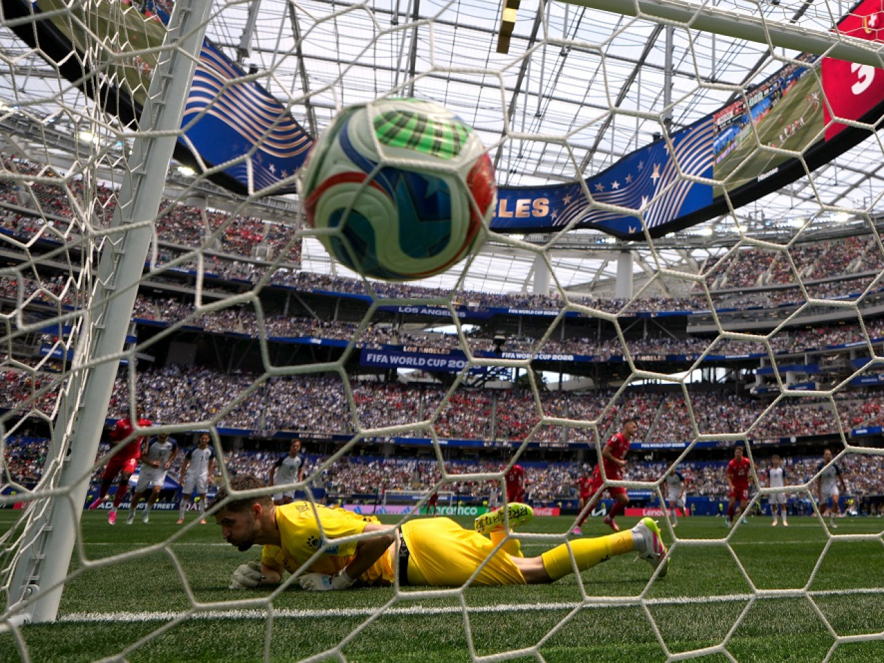 Granit Xhaka bags Switzerland's fourth from the penalty spot. Photo: Reuters