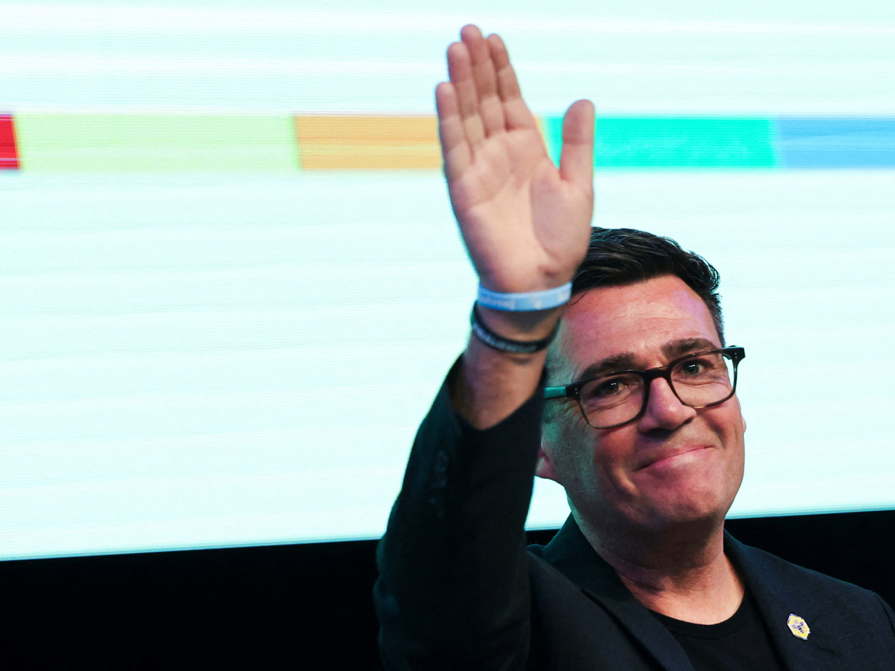 Andy Burnham celebrates with followers in Wigan following his Makerfield by-election victory. Photo: Reuters
