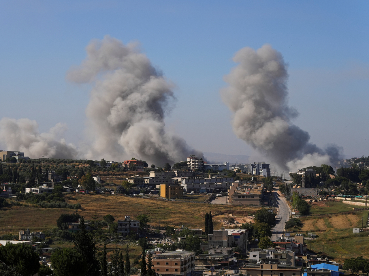 Israeli air strikes hit residential buildings in southern Lebanon near Nabatieh hours after a ceasefire went into effect. Photo: Reuters