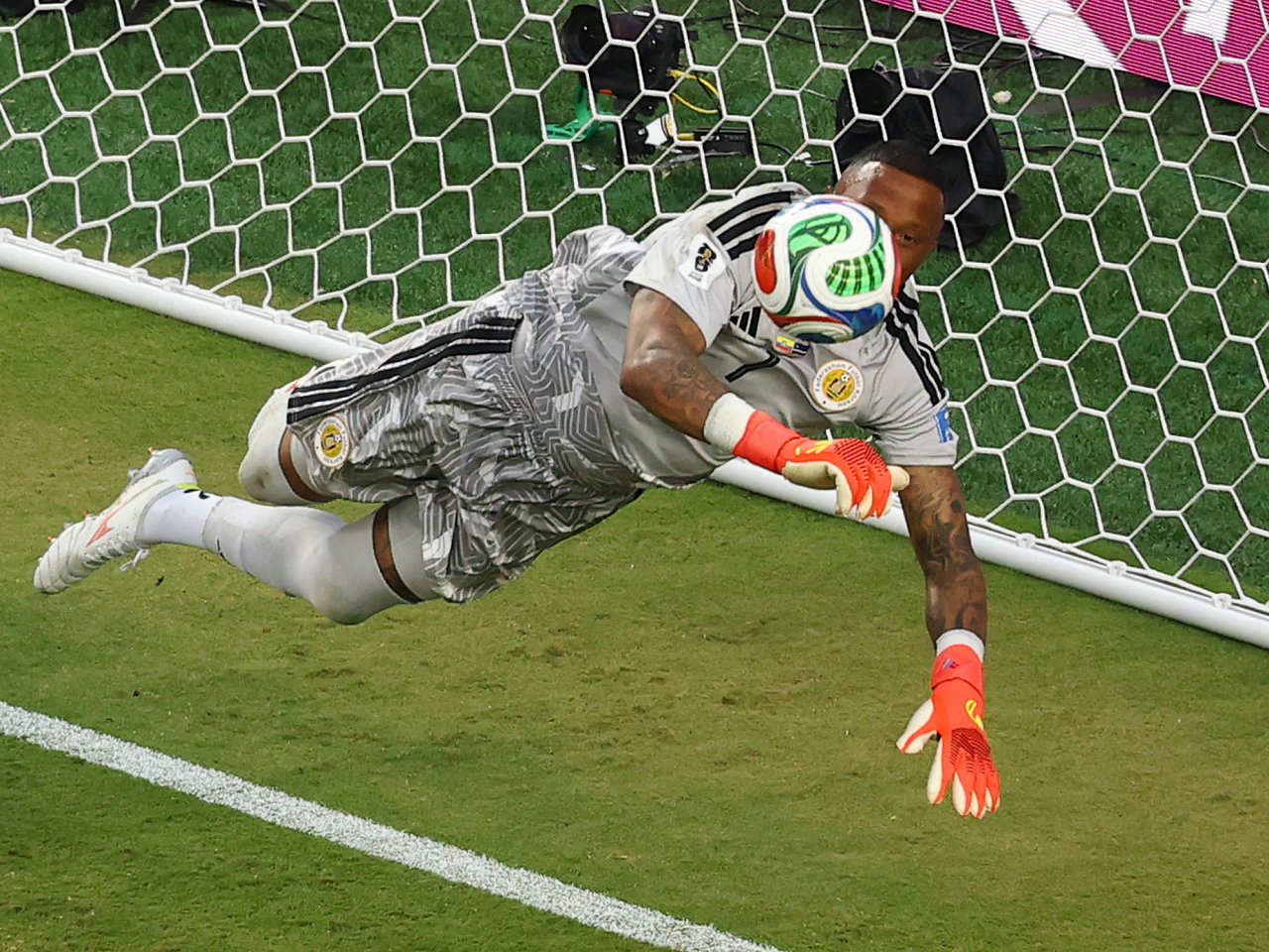 Curacao's Eloy Room in action as he makes a save to ensure his team finished with their historic first World Cup point. Photo: Reuters