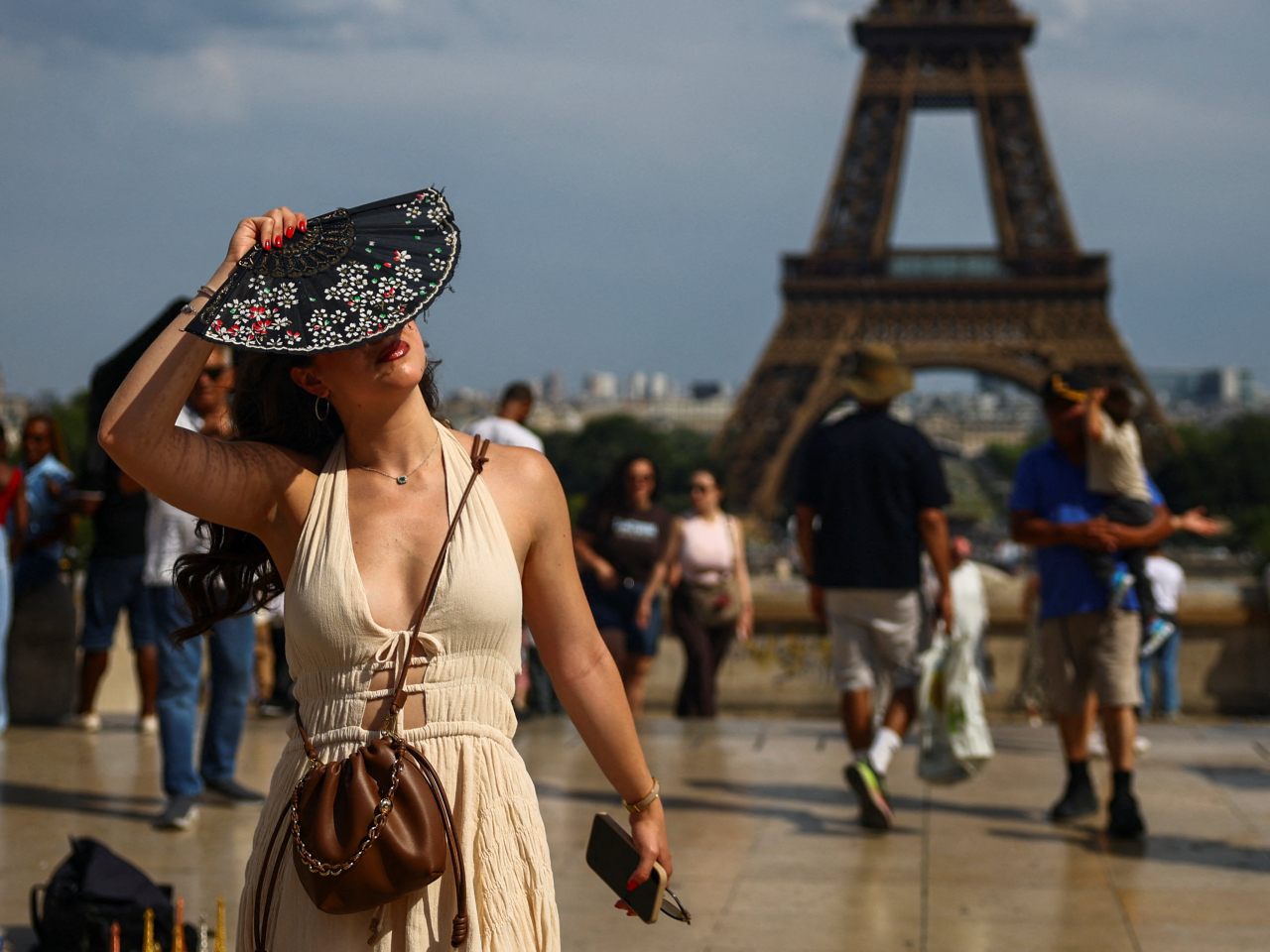 The ferocious heatwave has disrupted France, forcing the cancellation of some train services and the suspension of classes. Photo: Reuters